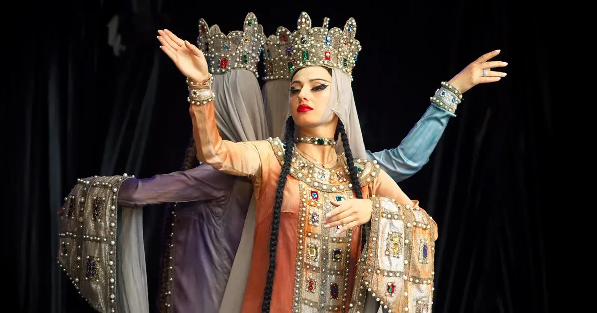 Sukhishvili ensemble dancers in traditional costume on stage
