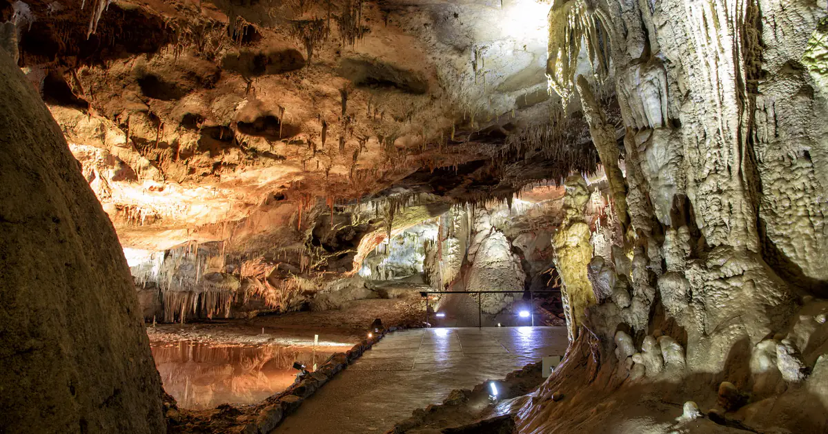 Flowstone columns and an underground pool on the route