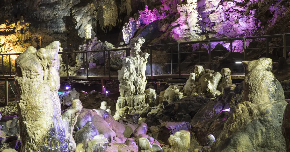 Stalagmites under coloured lights
